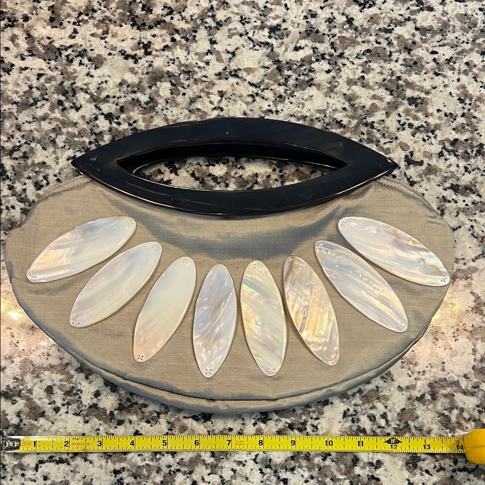 Elegant Tan Clutch with Shell Accents